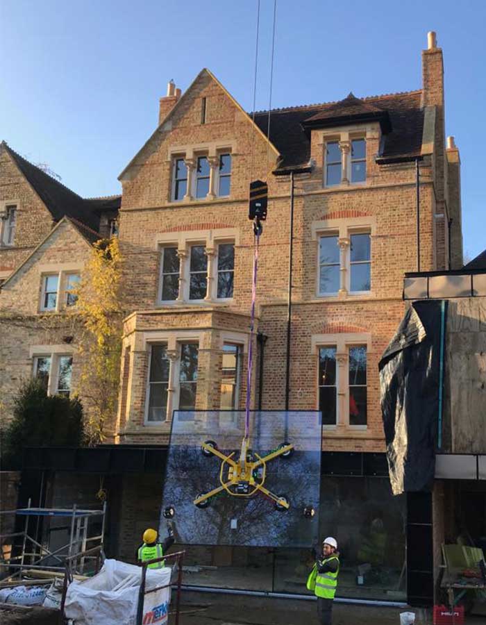 crane lifting glass oxford